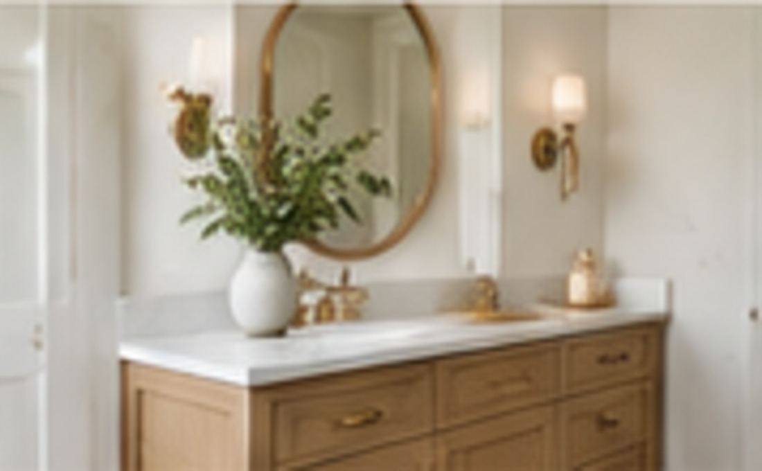 Bathroom with warm stone and softly lit finishes